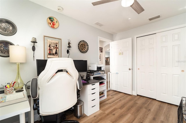 office area with ceiling fan and hardwood / wood-style flooring