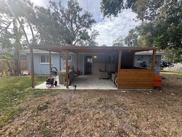 back of property with a patio area