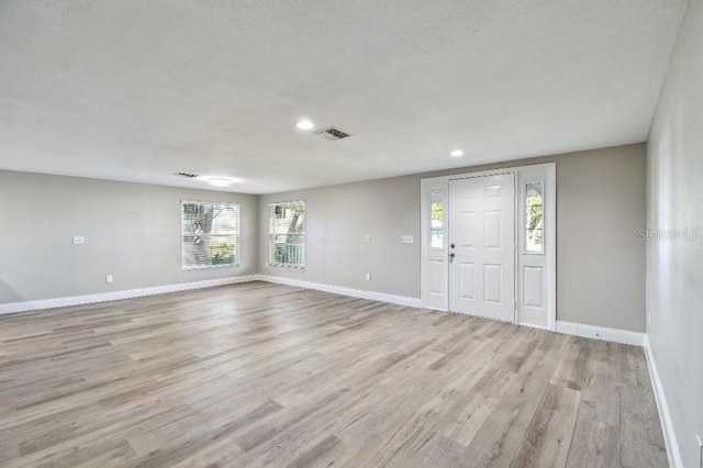 entrance foyer with light wood-type flooring