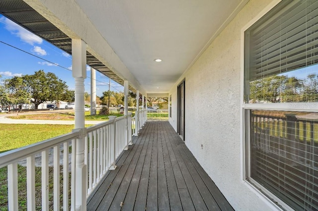 wooden terrace featuring a porch