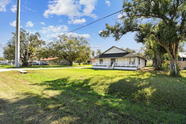 view of yard featuring a porch