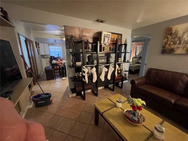 living room with light tile patterned floors