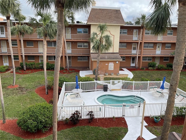 view of swimming pool featuring a patio area