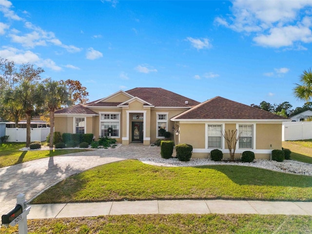 ranch-style house with a front yard