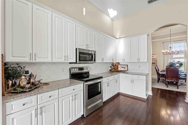 kitchen featuring white cabinets and stainless steel appliances