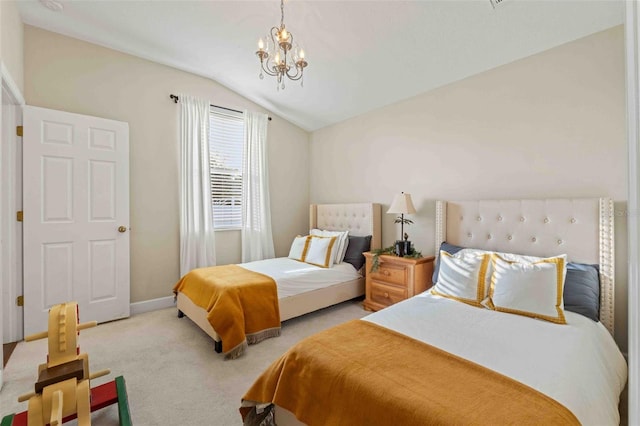 bedroom with a chandelier, light colored carpet, and lofted ceiling