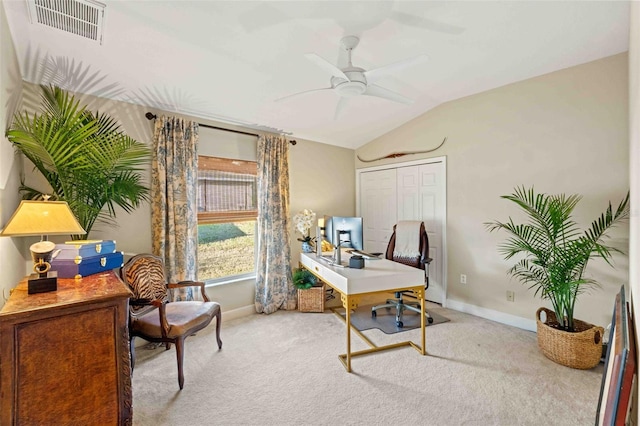 home office featuring light carpet, ceiling fan, and lofted ceiling