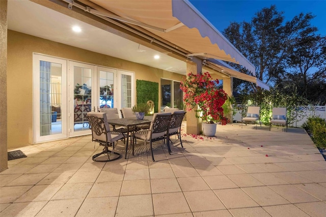 view of patio featuring french doors