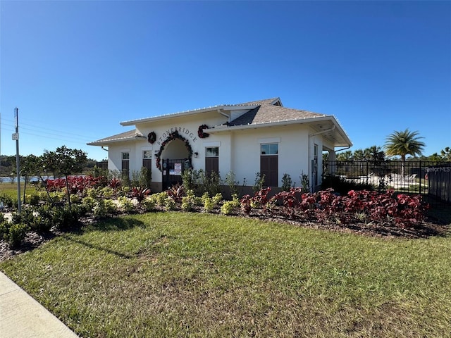 view of front of home with a front yard