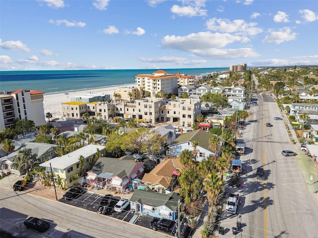 drone / aerial view featuring a view of the beach and a water view