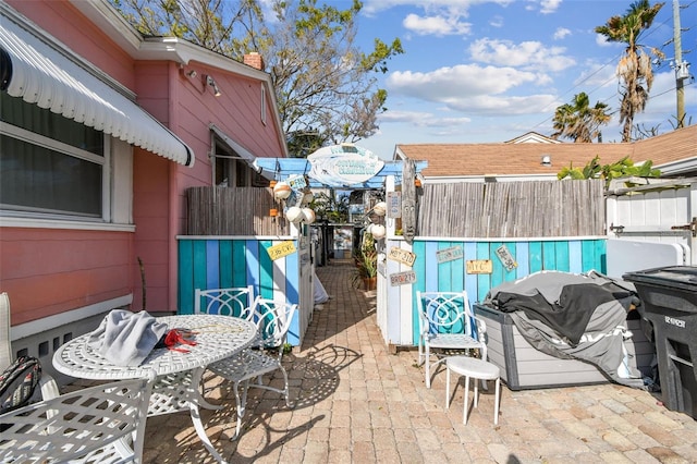 view of patio with a grill