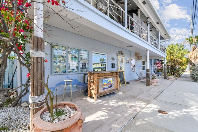 view of patio / terrace featuring exterior bar