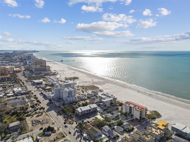 bird's eye view with a view of the beach and a water view