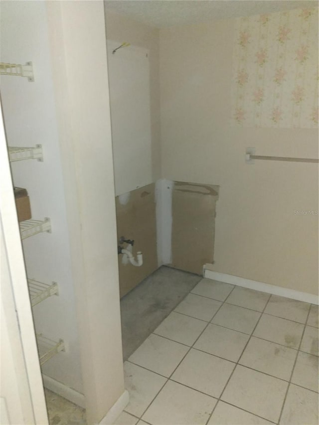 bathroom with tile patterned flooring