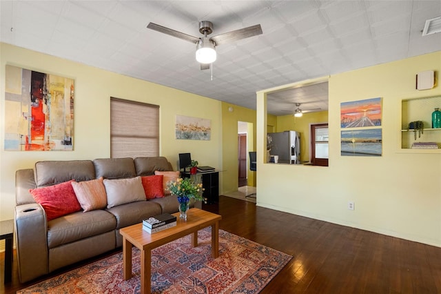 living room featuring dark hardwood / wood-style flooring