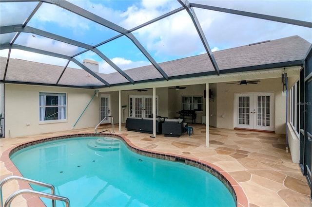 view of swimming pool with a lanai, a patio area, an outdoor hangout area, and french doors