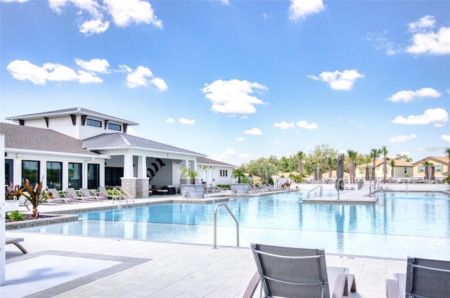 pool featuring a patio area