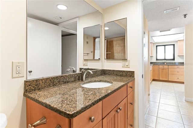 bathroom featuring vanity and tile patterned floors