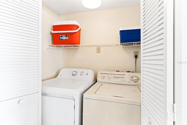 laundry area with washer and clothes dryer