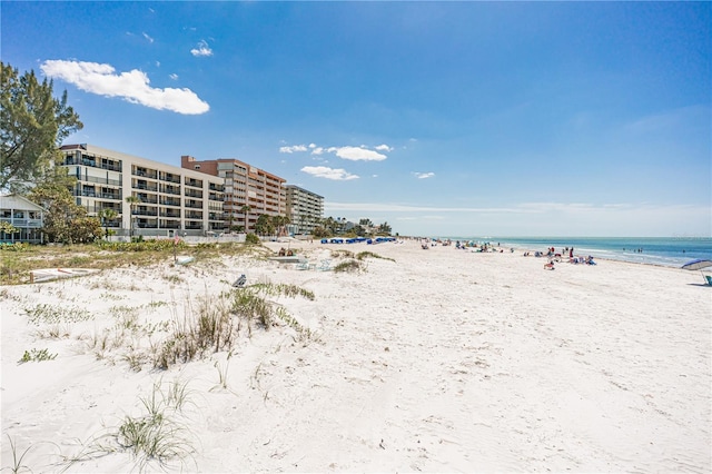 property view of water featuring a beach view