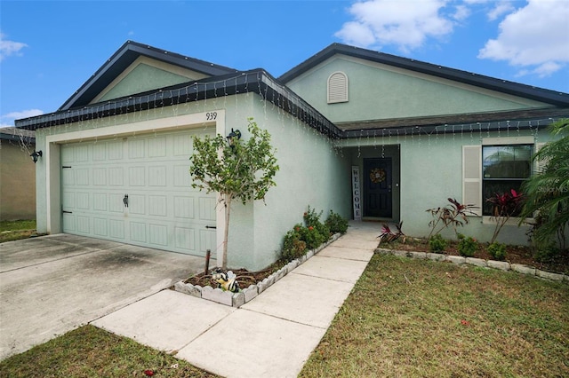 single story home featuring a garage