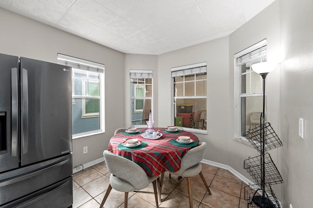 view of tiled dining space