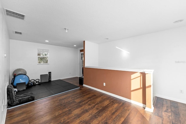 interior space with dark hardwood / wood-style floors