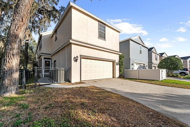 view of side of home with a garage