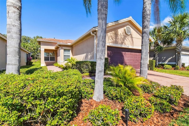 view of front of property featuring a garage