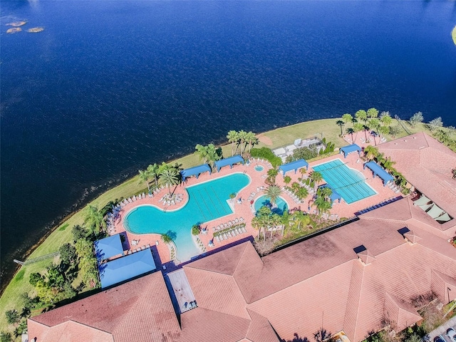 birds eye view of property featuring a water view