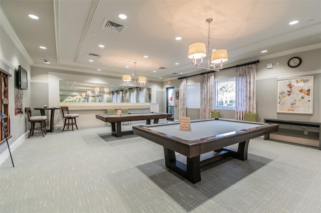 rec room with light colored carpet, ornamental molding, pool table, and a tray ceiling