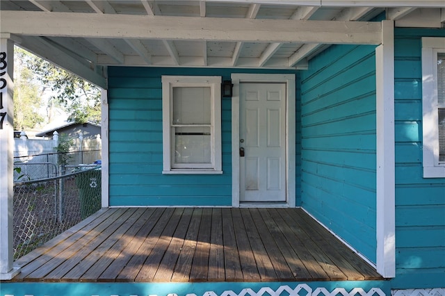 entrance to property featuring a deck