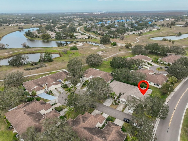 drone / aerial view featuring a water view