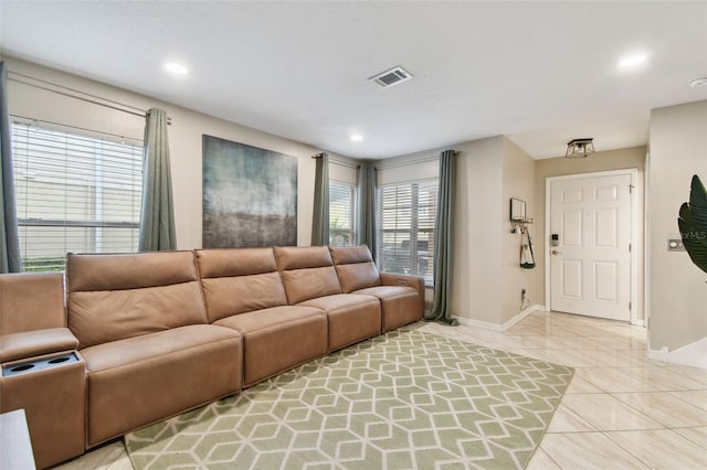 living room with light tile patterned floors