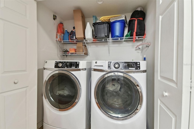 laundry area with washer and clothes dryer