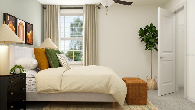 bedroom with ceiling fan and carpet