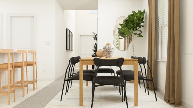 sitting room featuring light colored carpet