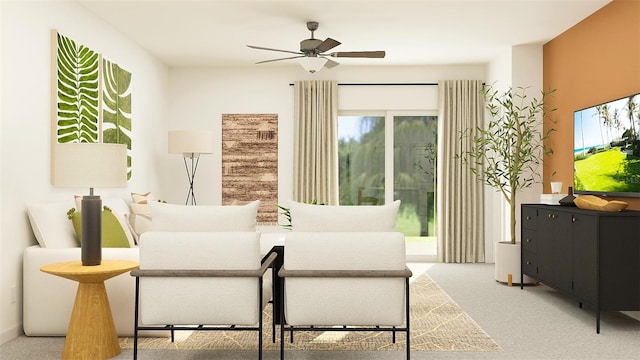 carpeted living room with ceiling fan