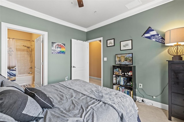 bedroom with connected bathroom, ceiling fan, carpet, and ornamental molding