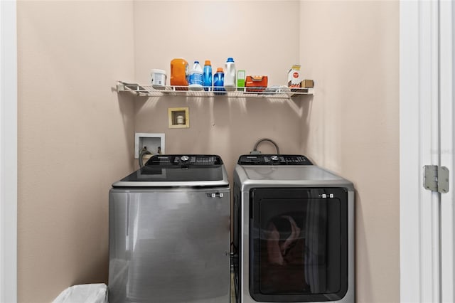 washroom with washer and clothes dryer