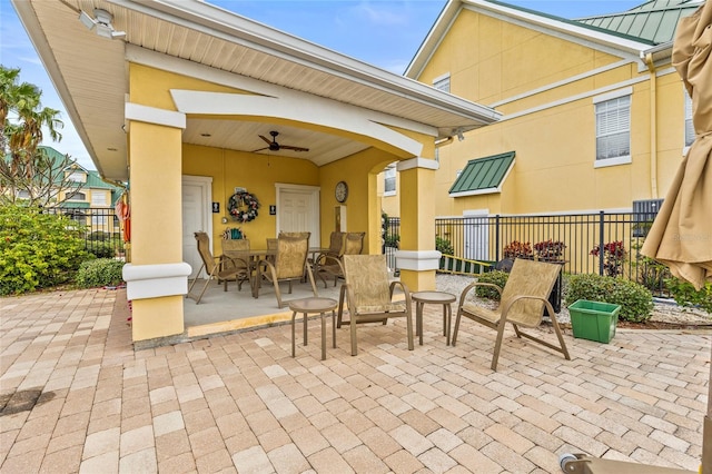 view of patio with ceiling fan