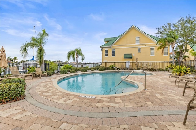 view of swimming pool featuring a patio