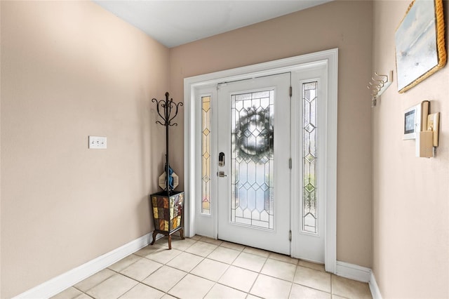 foyer with light tile patterned floors