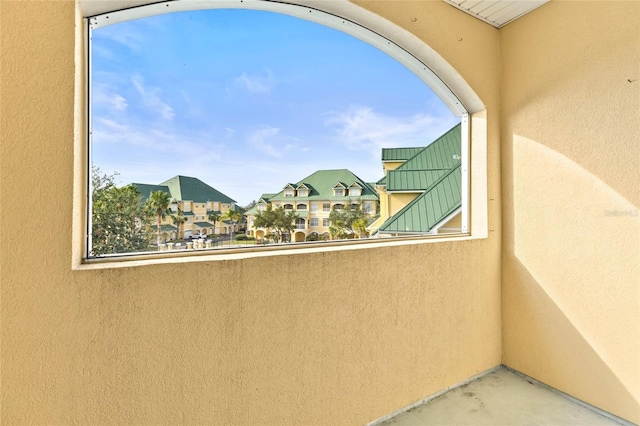 balcony featuring a residential view