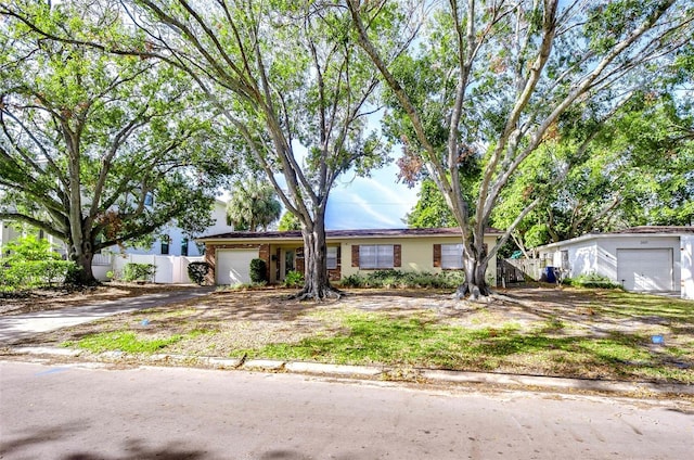 ranch-style home with a garage