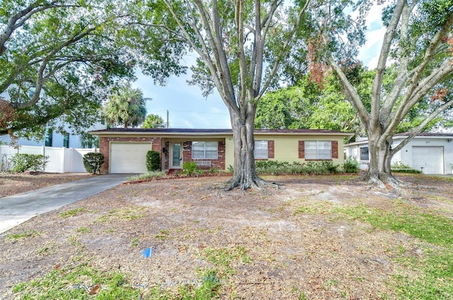 ranch-style house featuring a garage