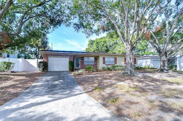 ranch-style home with a garage