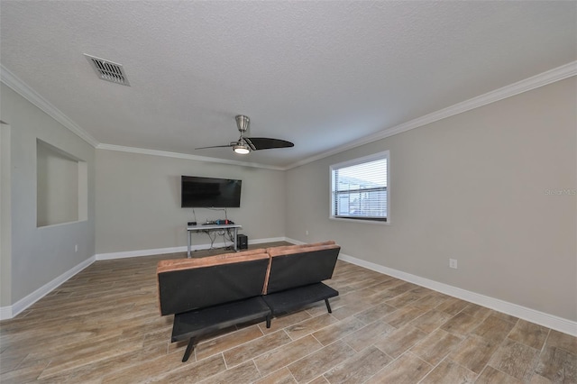 living room with ceiling fan, light hardwood / wood-style flooring, and ornamental molding