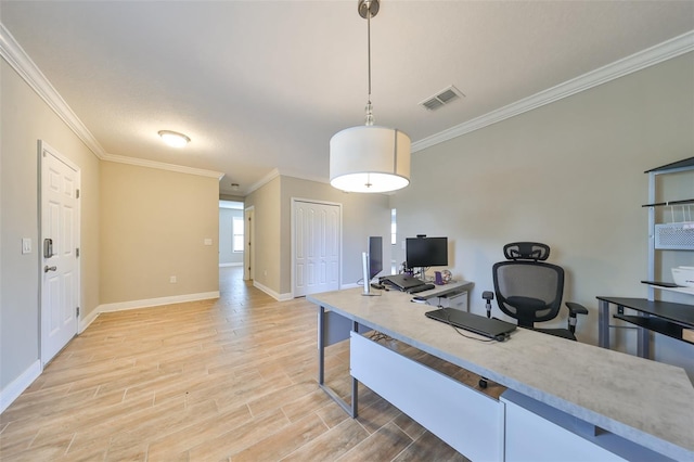 office area featuring light wood-type flooring and crown molding