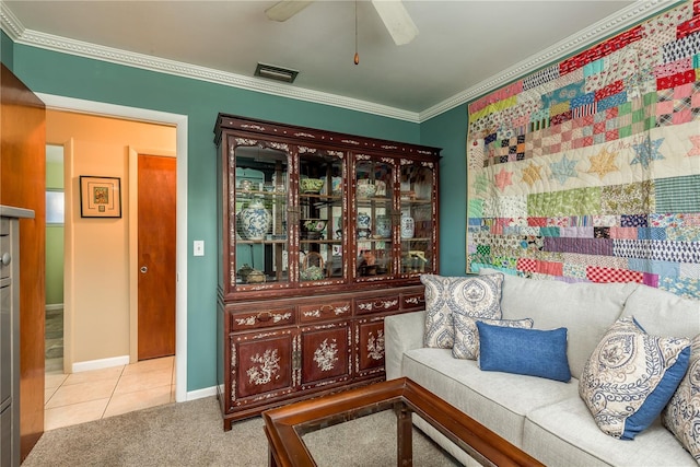 living area featuring light colored carpet and ornamental molding